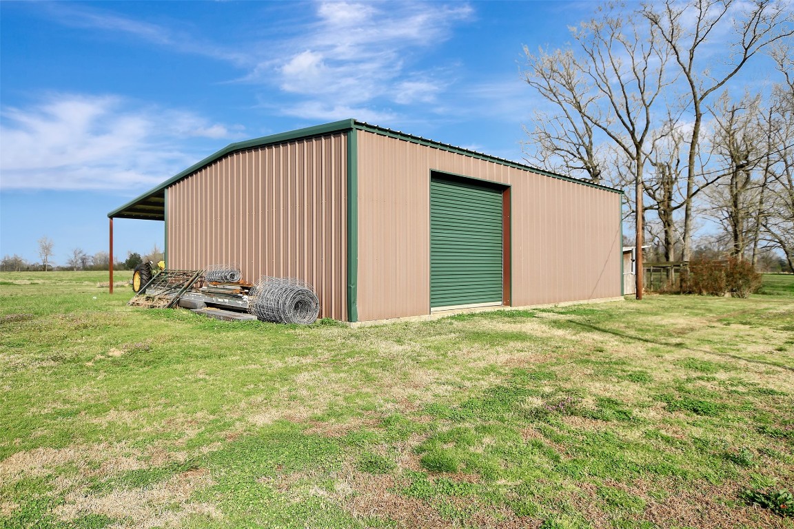 599 County Road 295 Garrison, TX 75946 - Photo 38 of 50 a view of a backyard with large trees