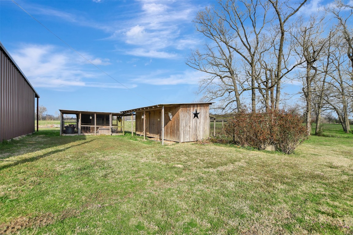 599 County Road 295 Garrison, TX 75946 - Photo 40 of 50 a front view of a house with a yard
