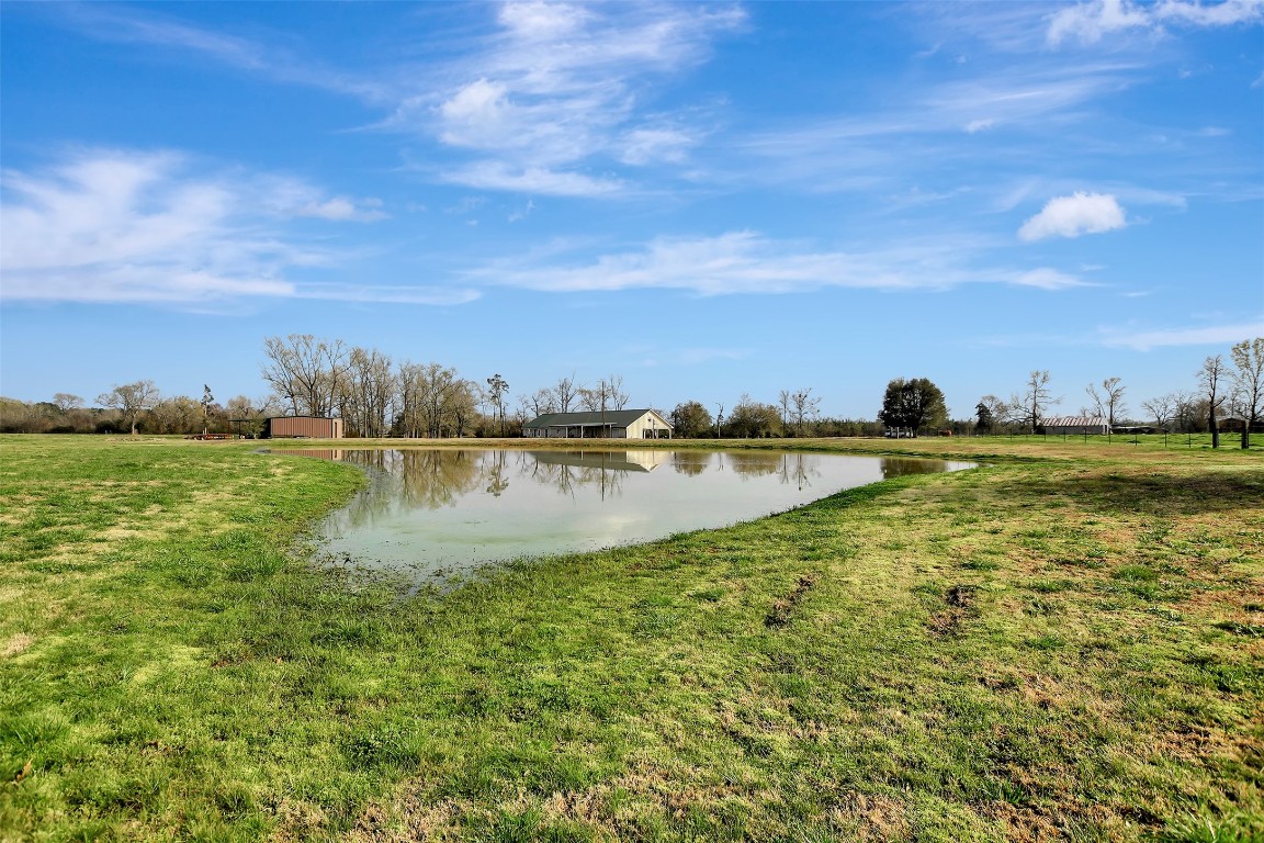 599 County Road 295 Garrison, TX 75946 - Photo 44 of 50 a view of a lake with a big yard