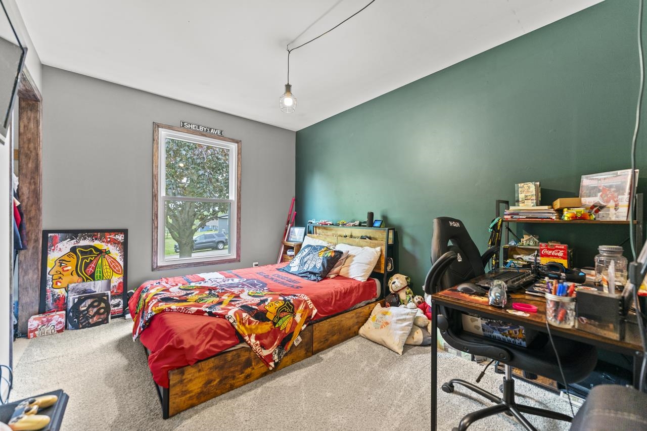 1084 Winborne Road Lake Summerset, IL 61019 - Photo 12 of 27 a bedroom with bed and a window