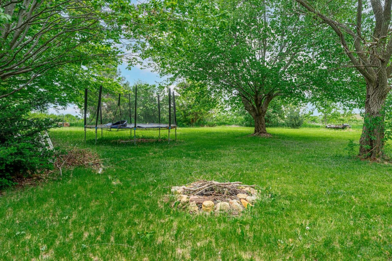1084 Winborne Road Lake Summerset, IL 61019 - Photo 23 of 27 a backyard of a house with lots of green space