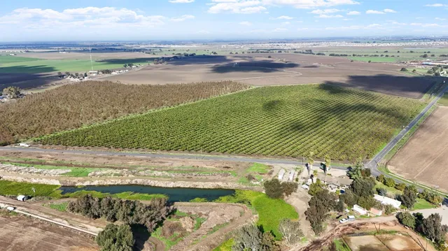 a view of a lake with a big yard