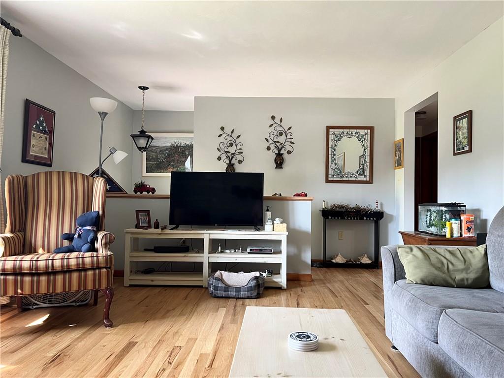 119 Walnut Street Apollo, PA 15613 - Photo 11 of 26 a living room with furniture and a flat screen tv