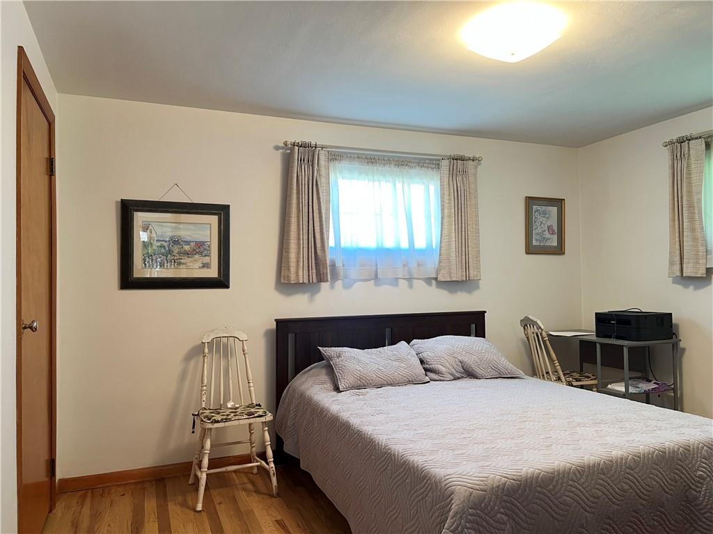 119 Walnut Street Apollo, PA 15613 - Photo 15 of 26 a bedroom with a bed and a table in it