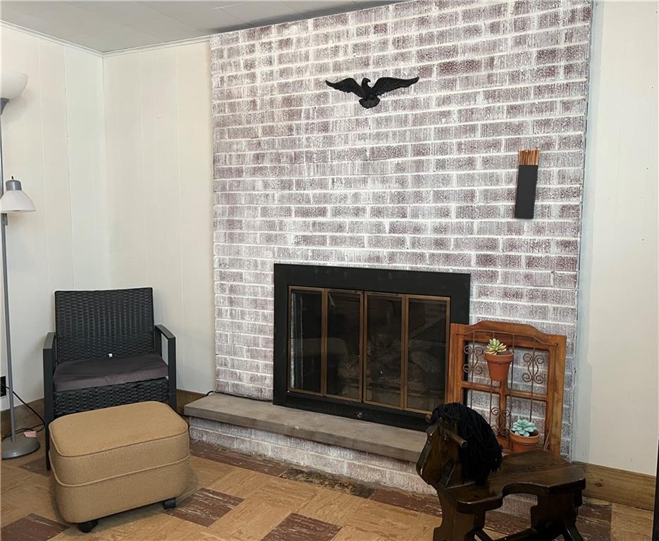 119 Walnut Street Apollo, PA 15613 - Photo 18 of 26 a living room with furniture and a fireplace