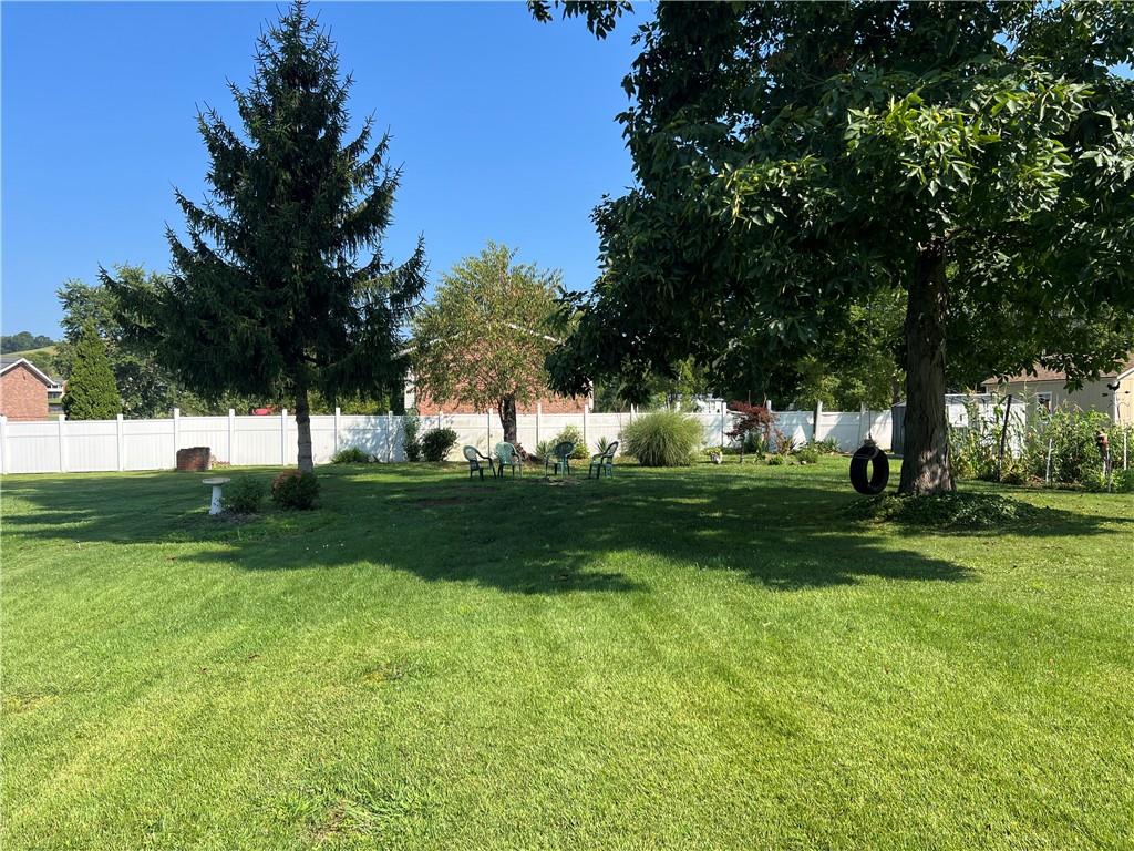 119 Walnut Street Apollo, PA 15613 - Photo 22 of 26 a view of grassy field with benches and trees all around