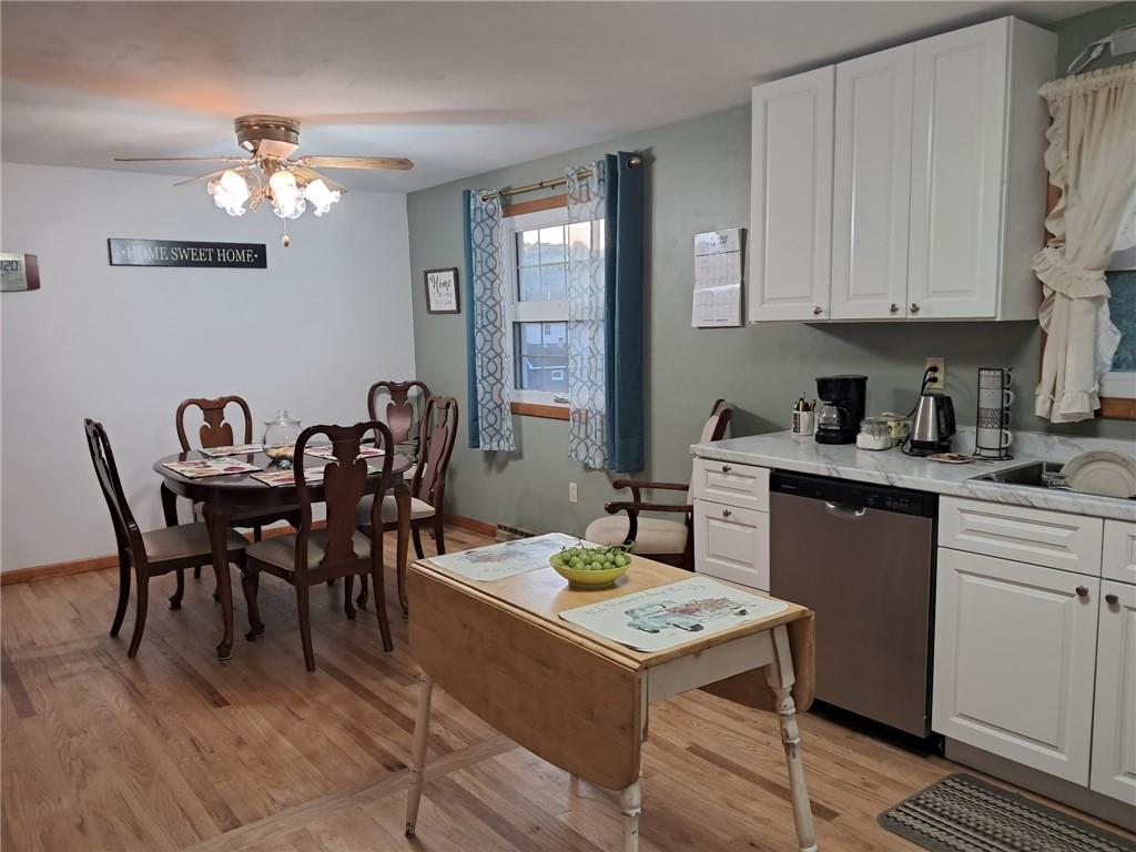 119 Walnut Street Apollo, PA 15613 - Photo 3 of 26 a view of a dining room with furniture and chandelier