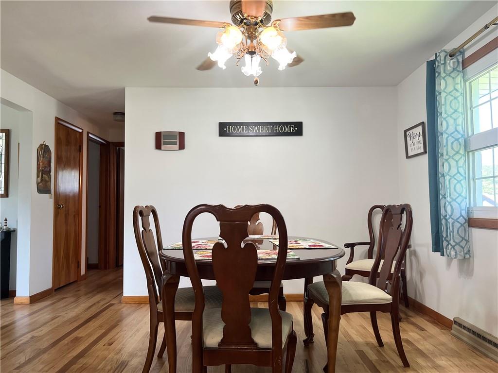 119 Walnut Street Apollo, PA 15613 - Photo 6 of 26 a view of a dining room with furniture window and wooden floor