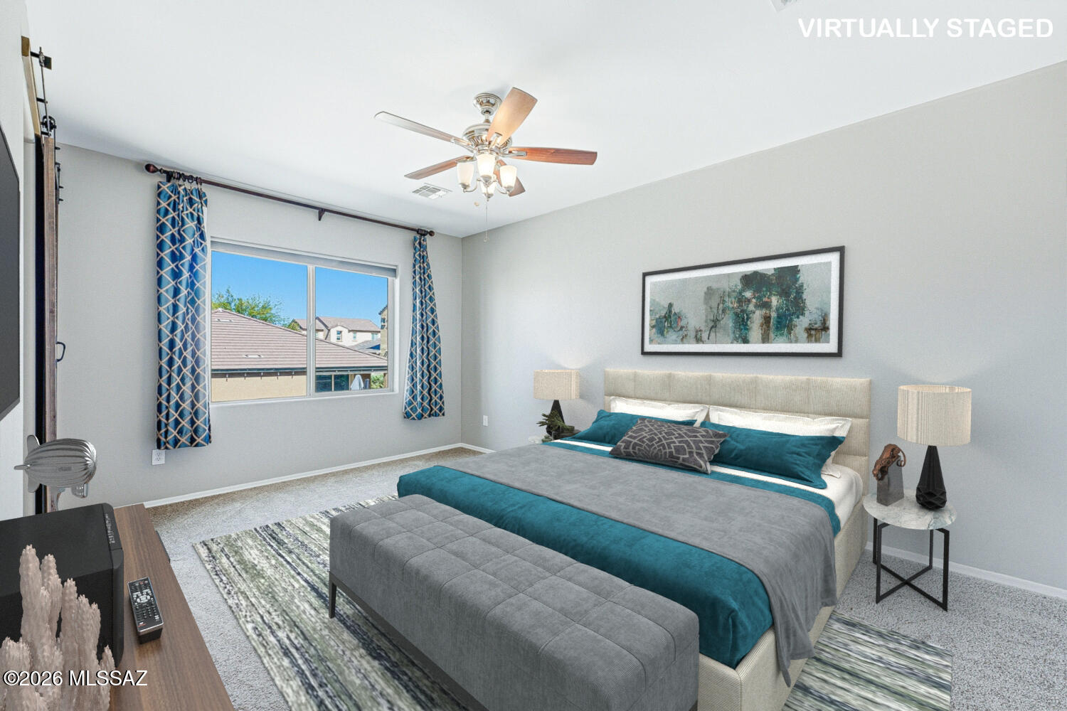 323 East Refuge Loop Vail, AZ 85641 - Photo 21 of 51 a bedroom with a large bed and a chandelier