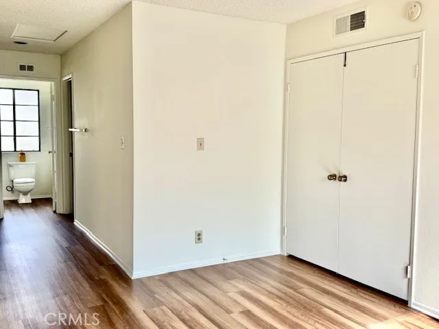 a view of a livingroom with wooden floor