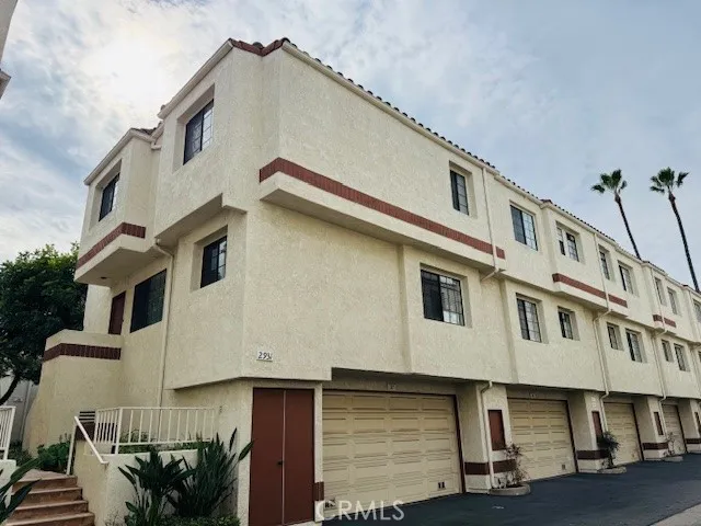 a front view of a house with garage