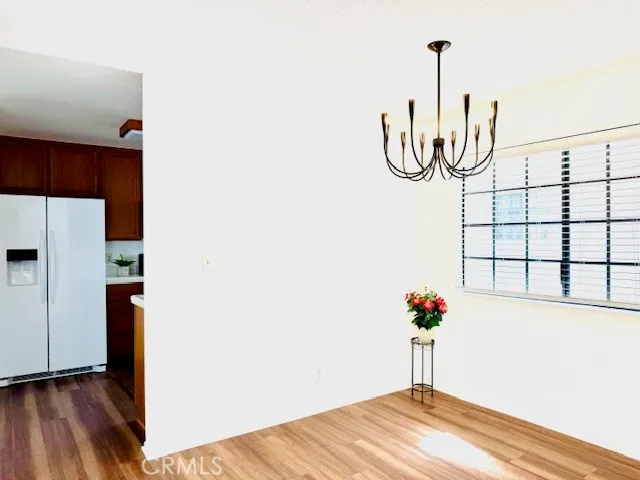 a view of a hallway with a potted plant