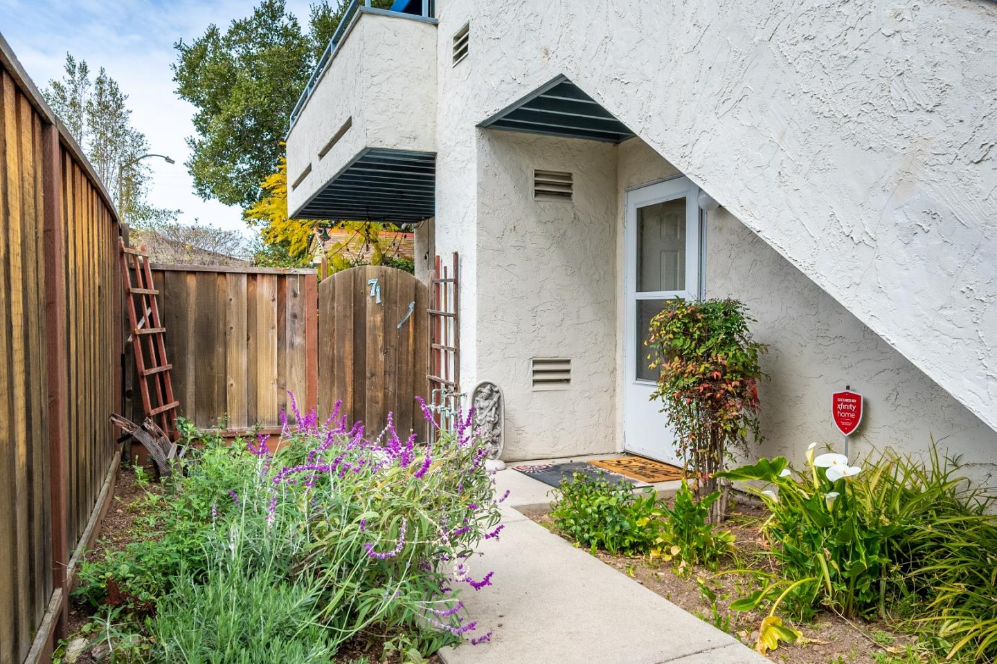 71 Redding Road Campbell, CA 95008 - Photo 1 of 20 a potted plant sitting in front of a house
