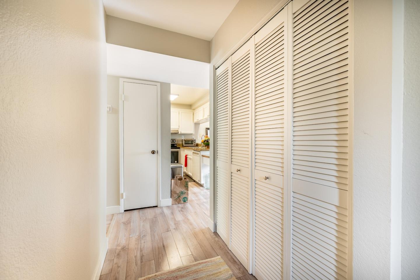 71 Redding Road Campbell, CA 95008 - Photo 8 of 20 a view of a room with wooden floor and a bathroom