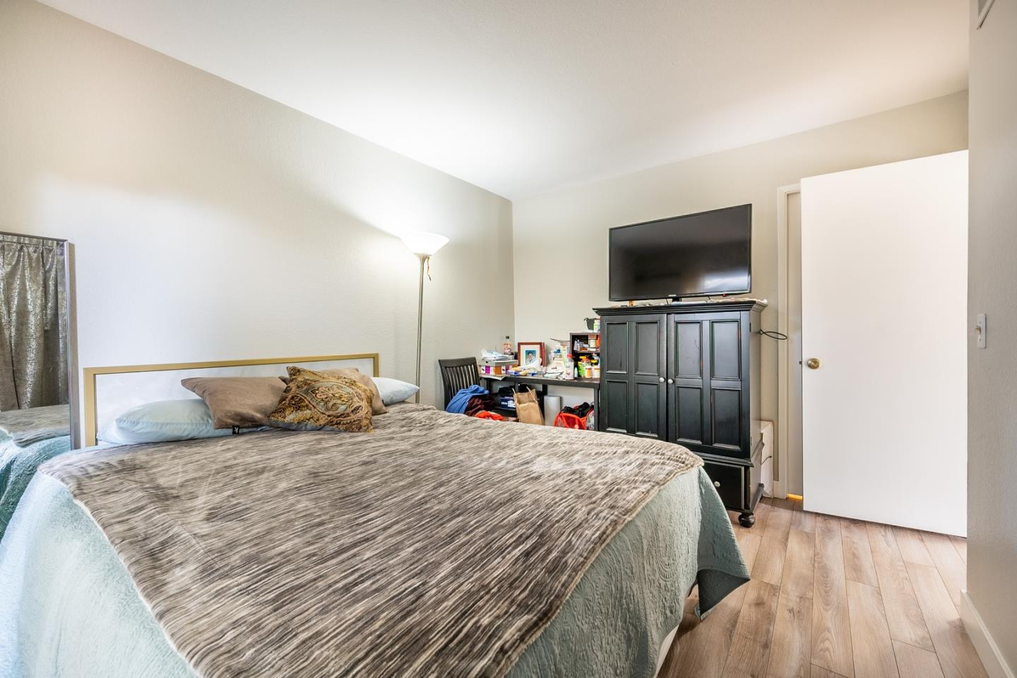 71 Redding Road Campbell, CA 95008 - Photo 9 of 20 a bedroom with a bed and a flat screen tv