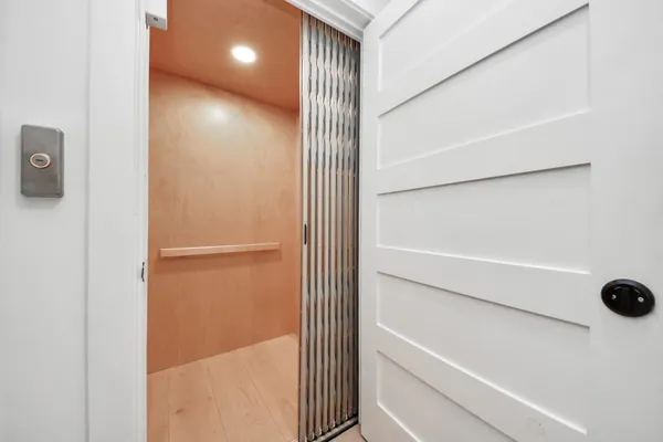 a view of a hallway with closet