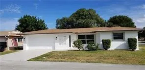a view of a house with garage