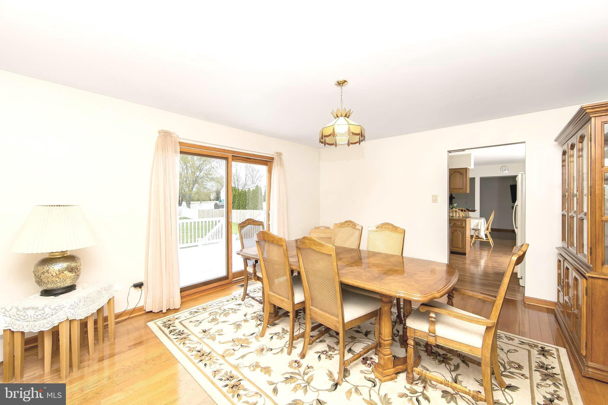 11 Plantation Court Glassboro, NJ 08028 - Photo 15 of 54 Large dining room walks through to kitchen
