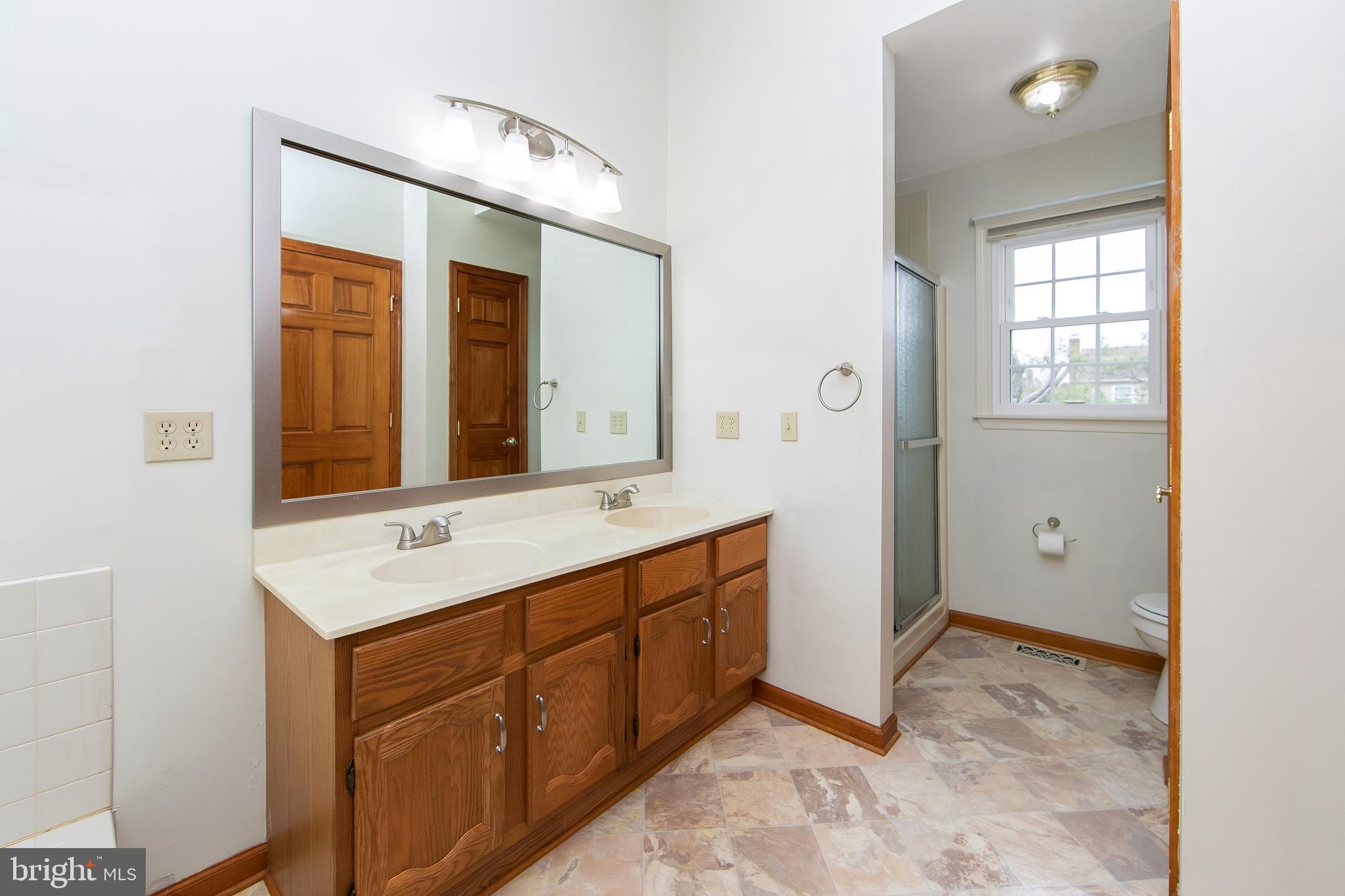 11 Plantation Court Glassboro, NJ 08028 - Photo 29 of 54 Primary Bath double sink cabinet