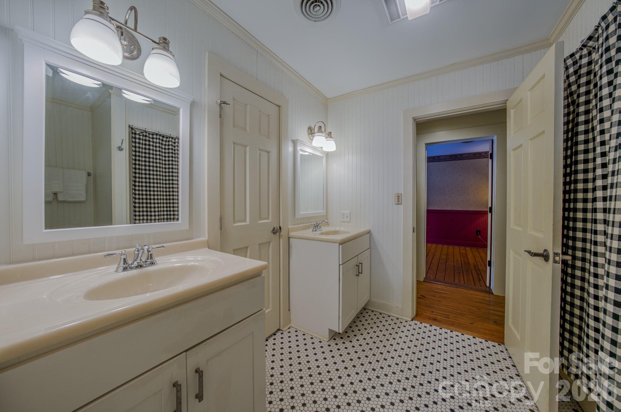 75 Old Gap Creek Road Fairview, NC 28730 - Photo 28 of 43 a bathroom with a sink and a mirror