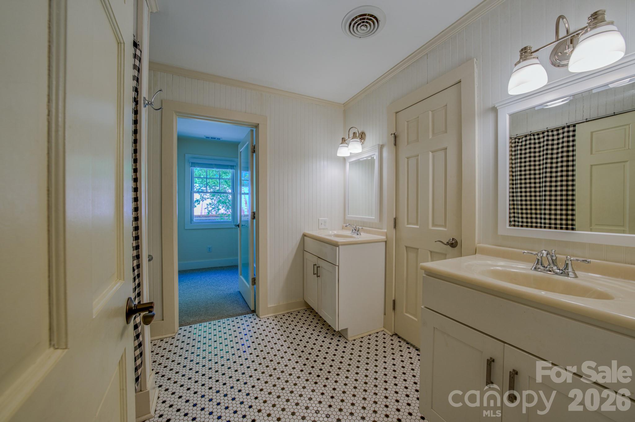 75 Old Gap Creek Road Fairview, NC 28730 - Photo 29 of 43 a bathroom with a sink a toilet and shower