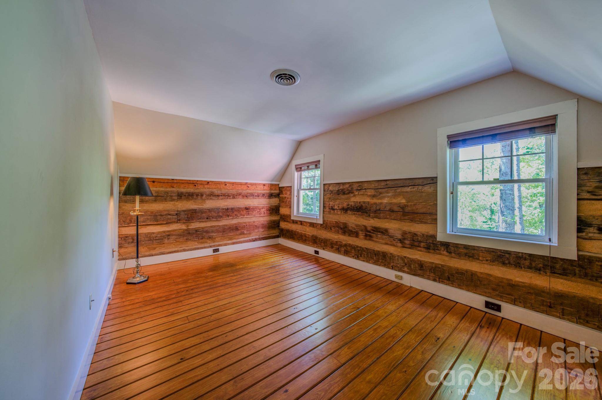 75 Old Gap Creek Road Fairview, NC 28730 - Photo 31 of 43 a view of room with wooden floor and window
