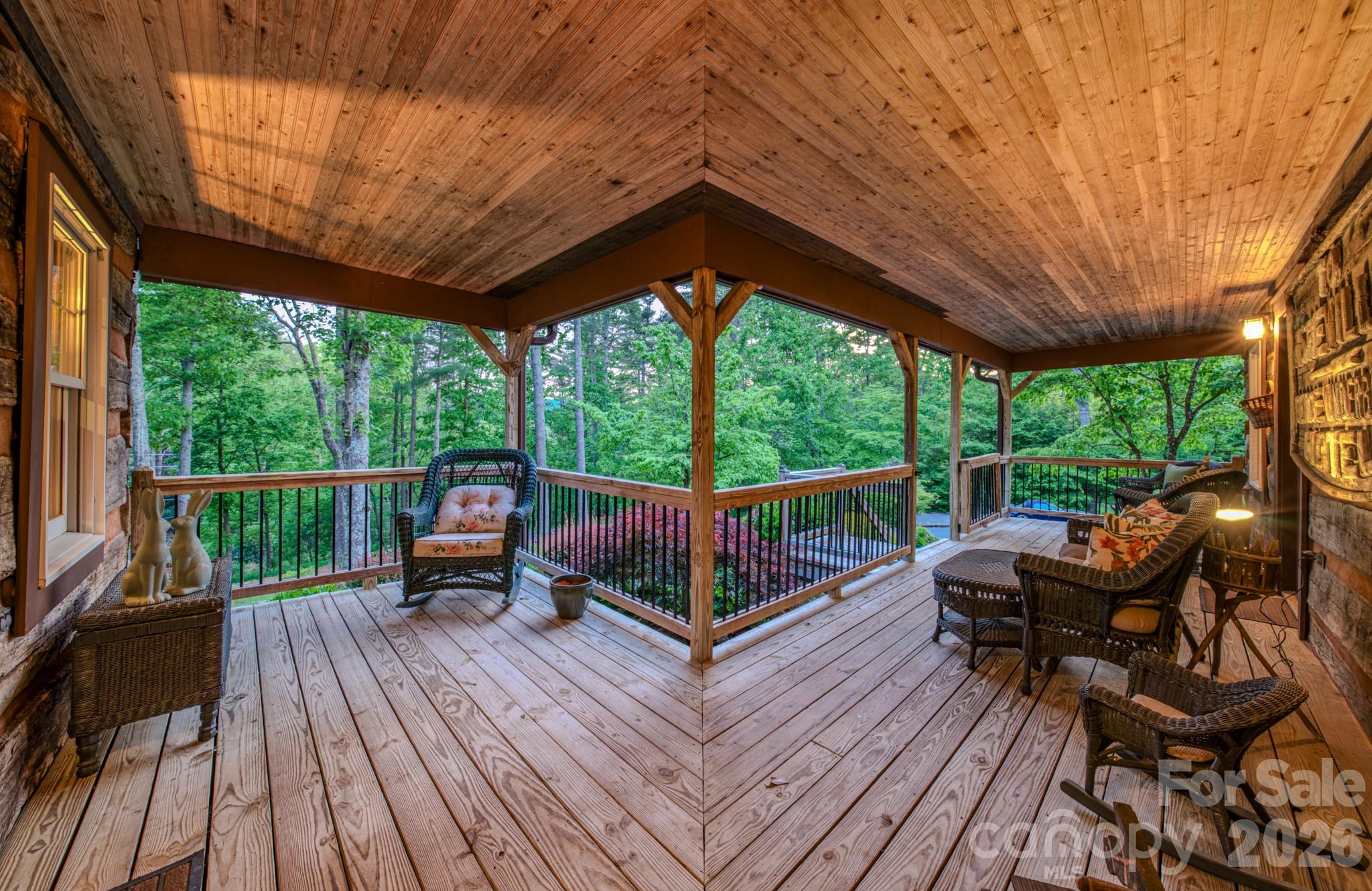 75 Old Gap Creek Road Fairview, NC 28730 - Photo 38 of 43 a view of a chairs and table in the balcony