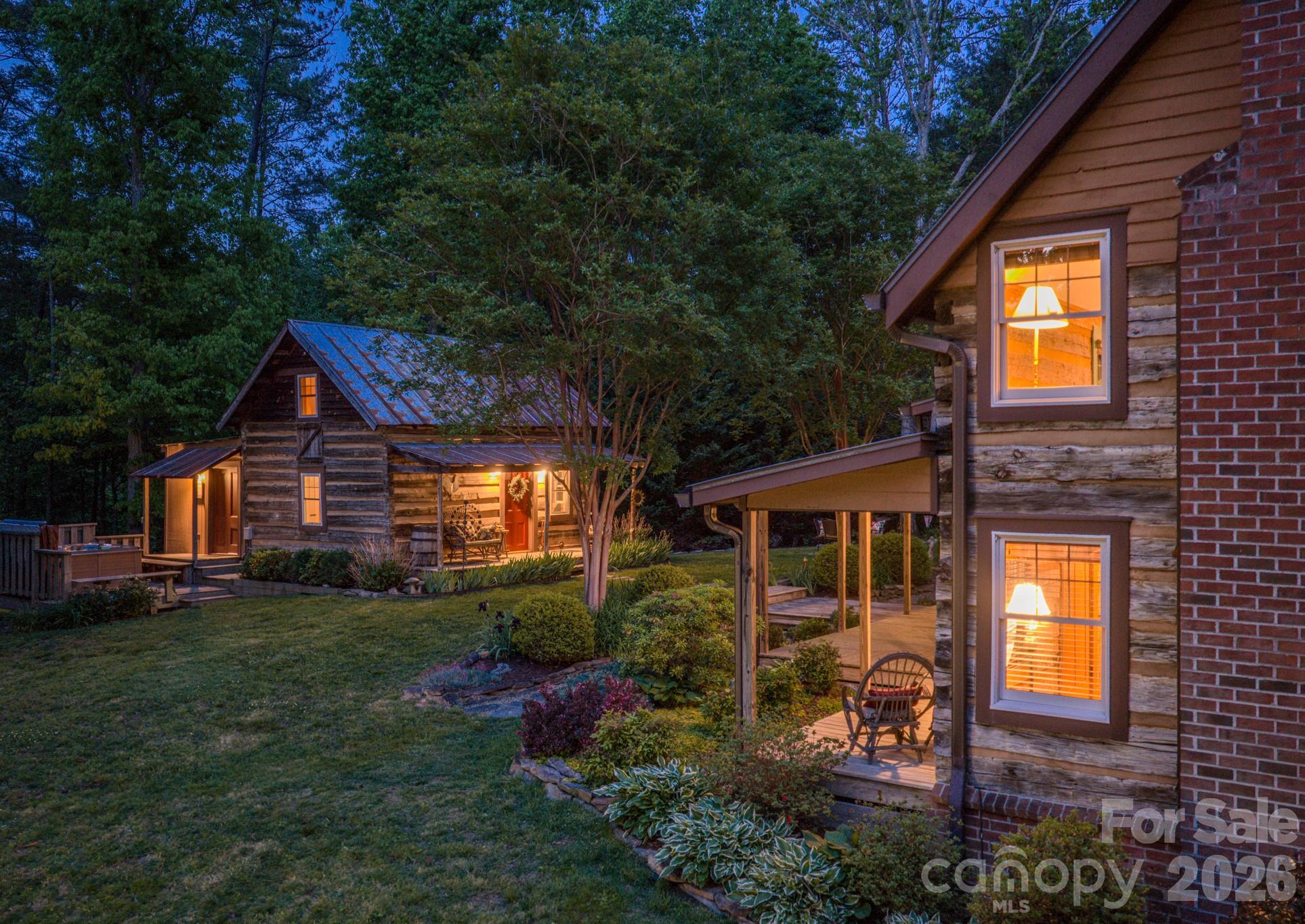75 Old Gap Creek Road Fairview, NC 28730 - Photo 10 of 43 a view of a house with backyard and porch