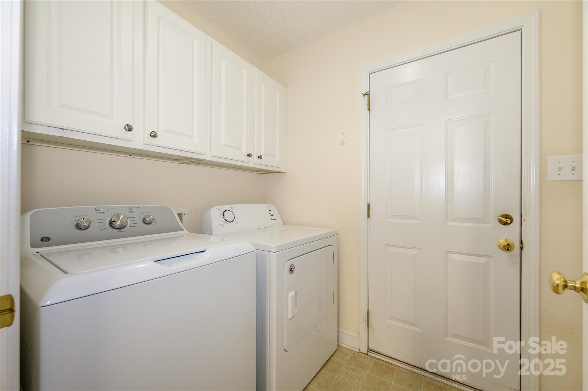 12617 Hill Pine Road Midland, NC 28107 - Photo 15 of 42 a utility room with dryer and washer