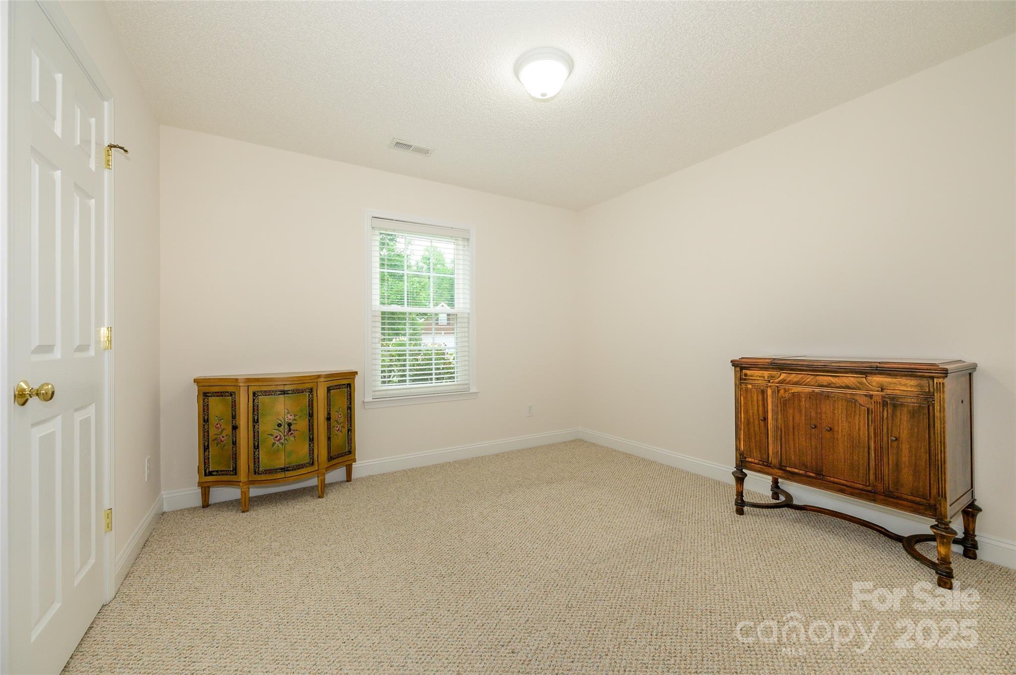 12617 Hill Pine Road Midland, NC 28107 - Photo 17 of 42 an empty room with closet