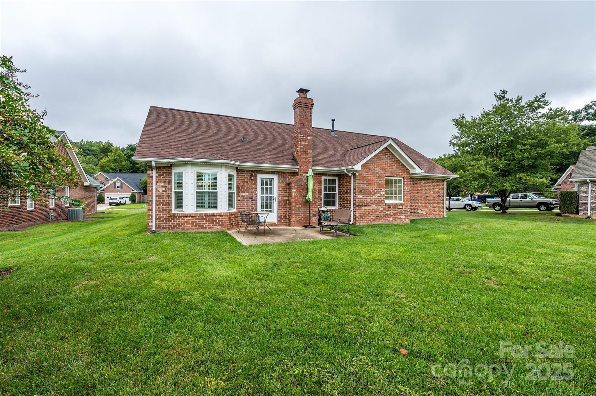 12617 Hill Pine Road Midland, NC 28107 - Photo 28 of 42 a front view of a house with a yard