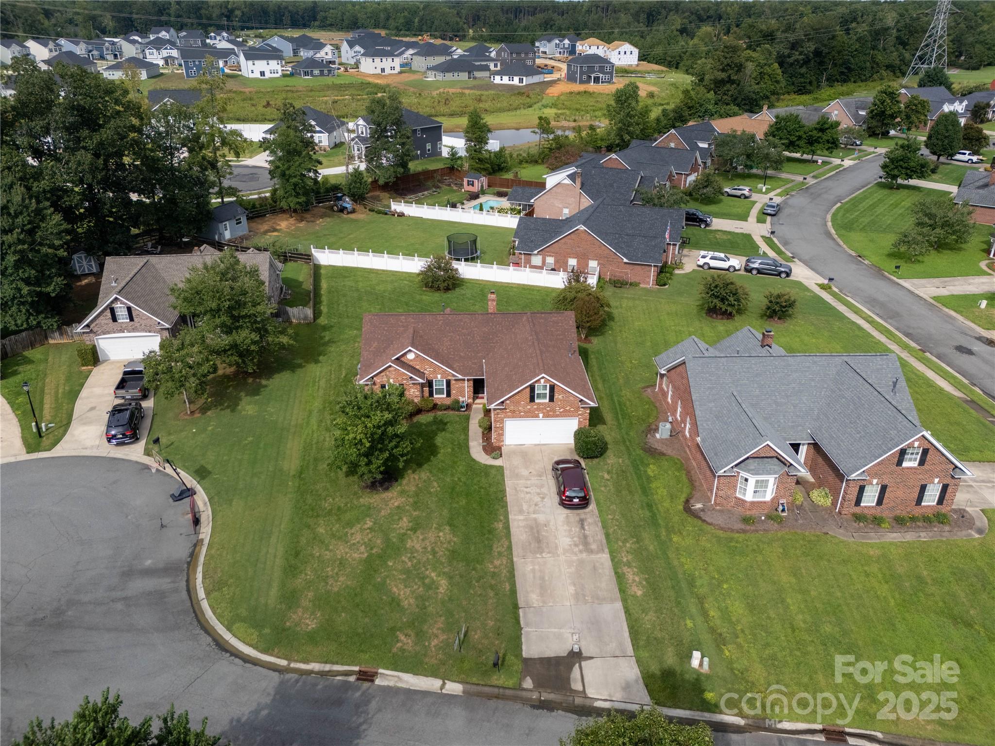 12617 Hill Pine Road Midland, NC 28107 - Photo 38 of 42 an aerial view of a house with a garden and yard