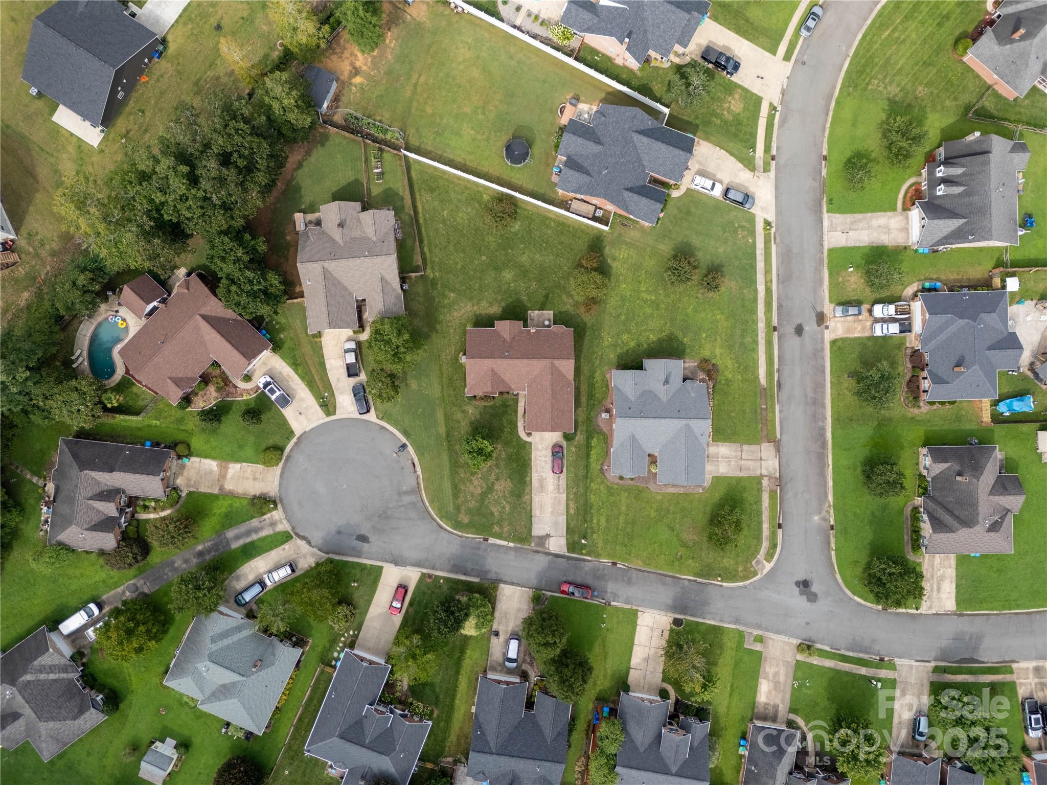 12617 Hill Pine Road Midland, NC 28107 - Photo 40 of 42 an aerial view of houses with outdoor space