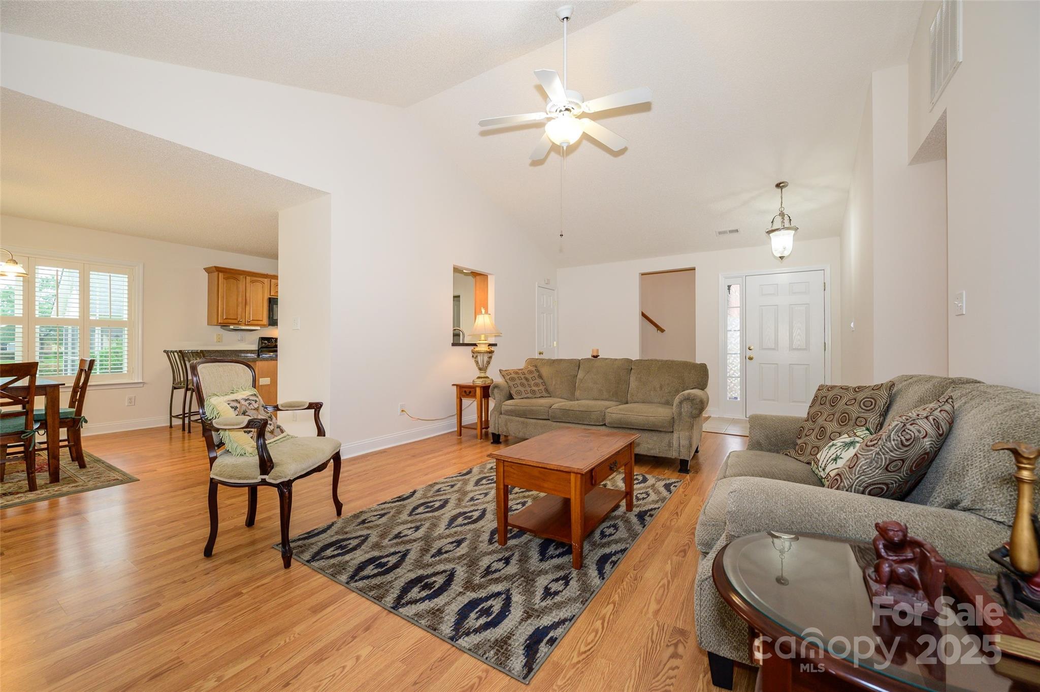 12617 Hill Pine Road Midland, NC 28107 - Photo 6 of 42 a living room with furniture and wooden floor