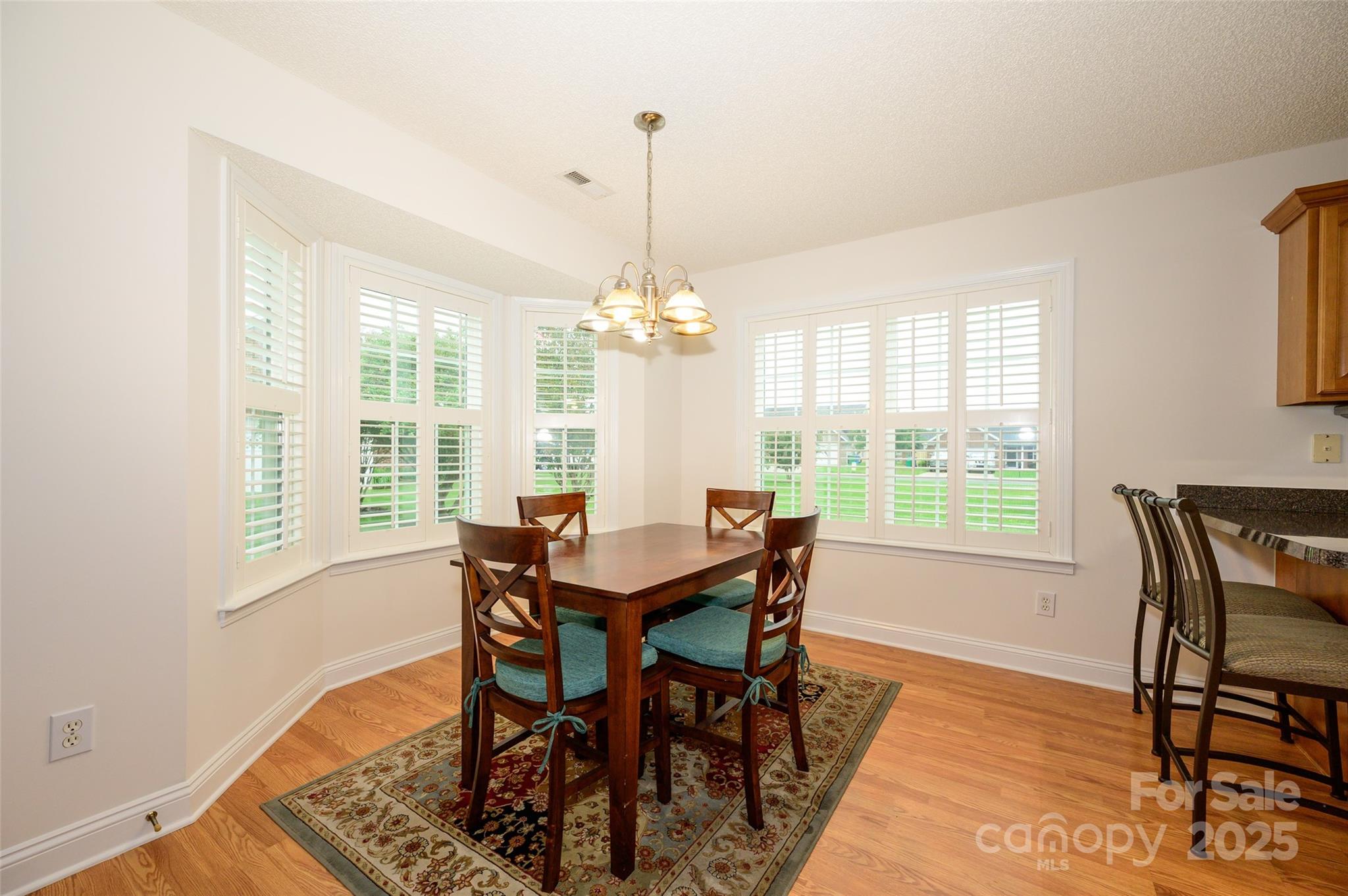 12617 Hill Pine Road Midland, NC 28107 - Photo 8 of 42 a view of a dining room with furniture window and outside view