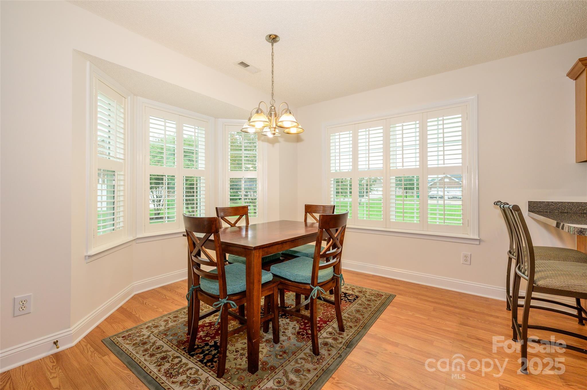 12617 Hill Pine Road Midland, NC 28107 - Photo 9 of 42 a view of a dining room with furniture window and outside view