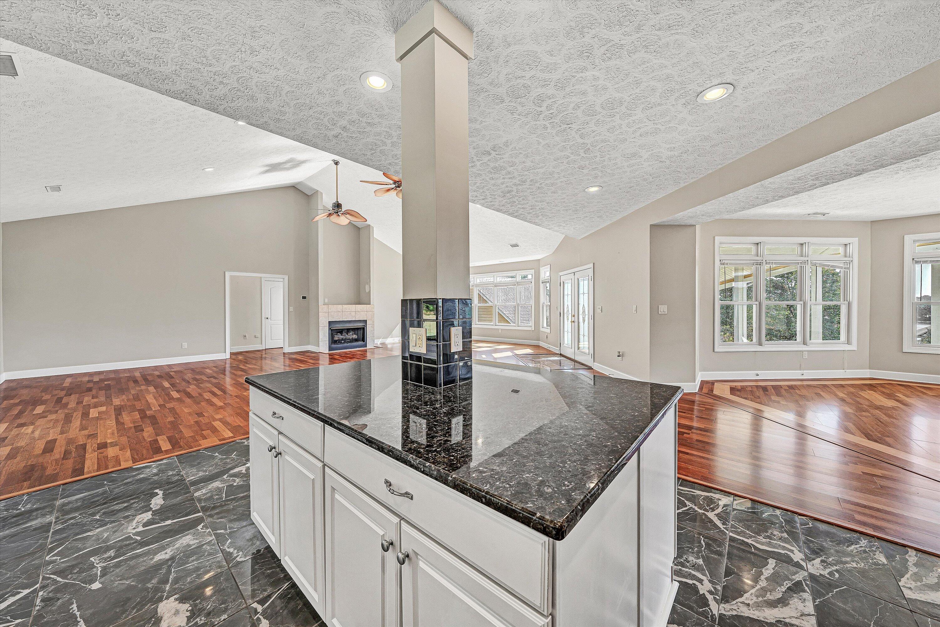 537 Calypso Road Moneta, VA 24121 - Photo 19 of 55 a kitchen with stainless steel appliances granite countertop a sink and a counter space
