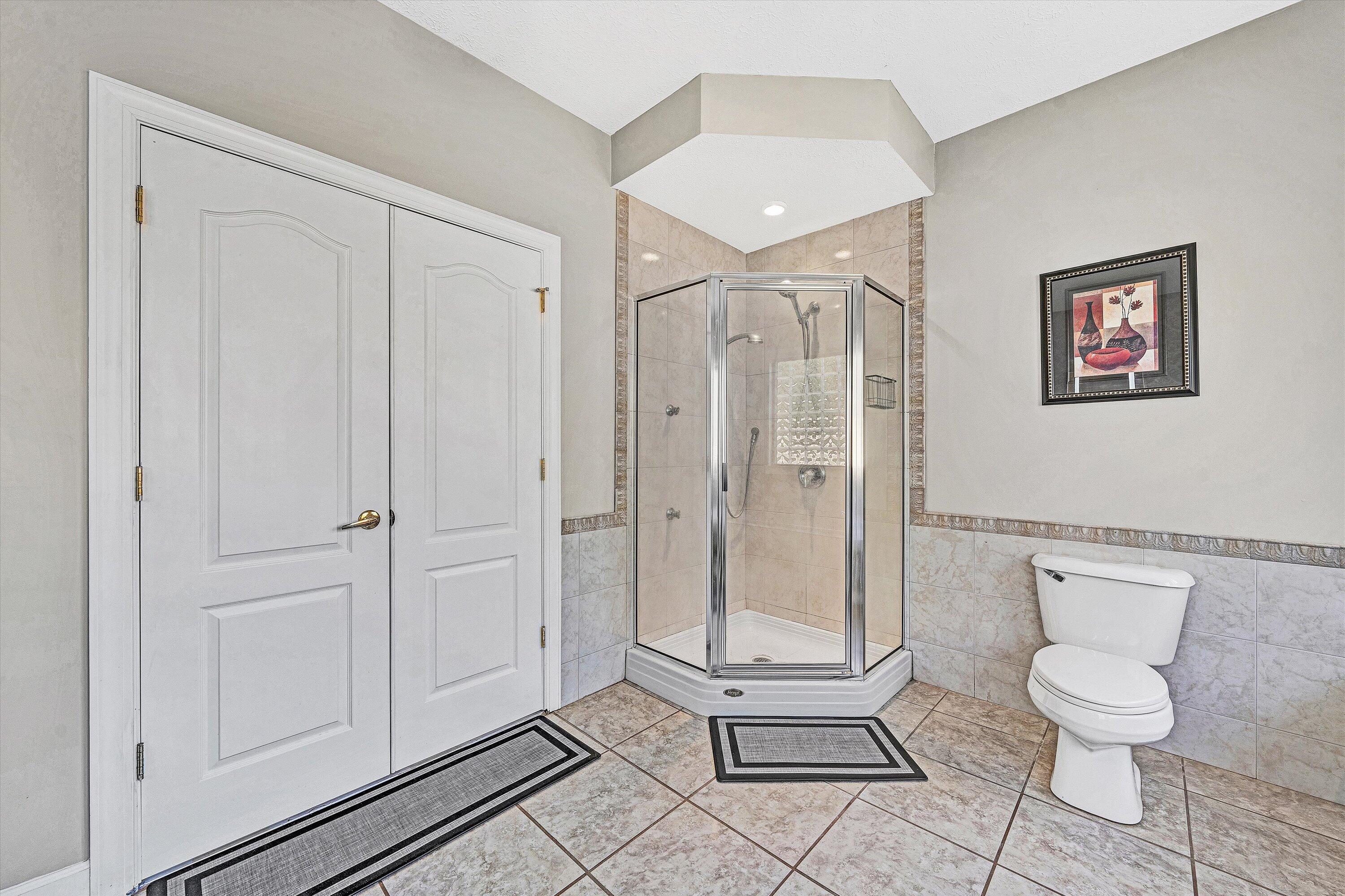 537 Calypso Road Moneta, VA 24121 - Photo 31 of 55 a bathroom with a toilet and a shower