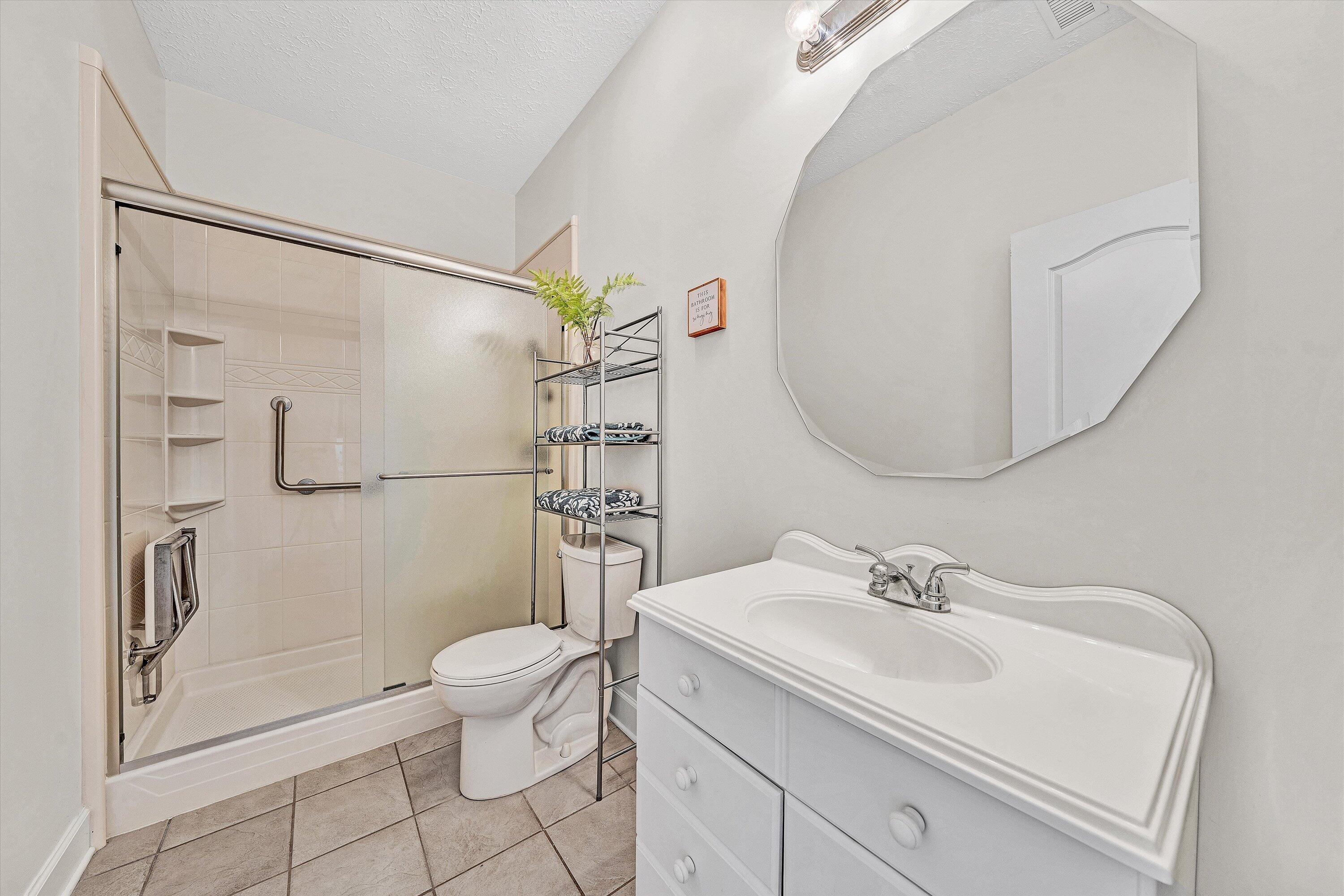 537 Calypso Road Moneta, VA 24121 - Photo 34 of 55 a bathroom with a sink toilet and shower