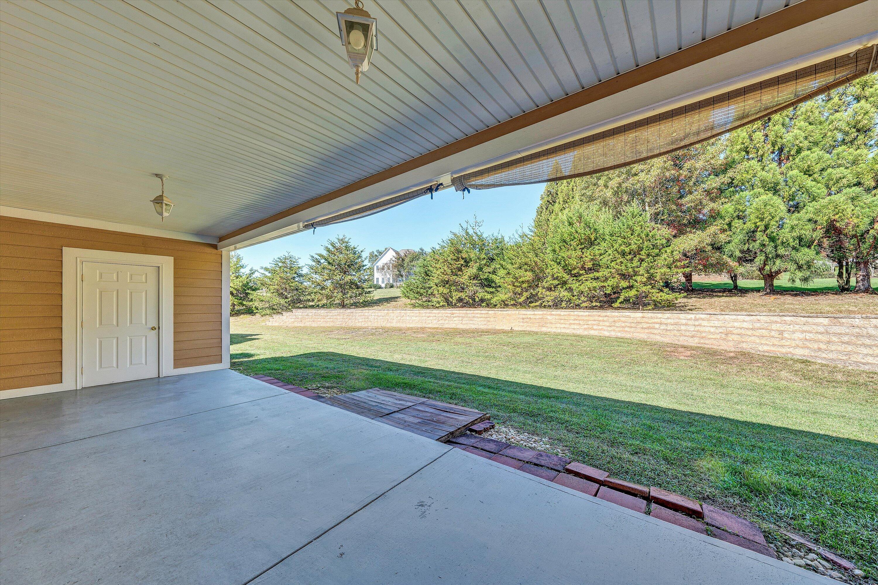 537 Calypso Road Moneta, VA 24121 - Photo 37 of 55 a view of a yard with an outdoor space