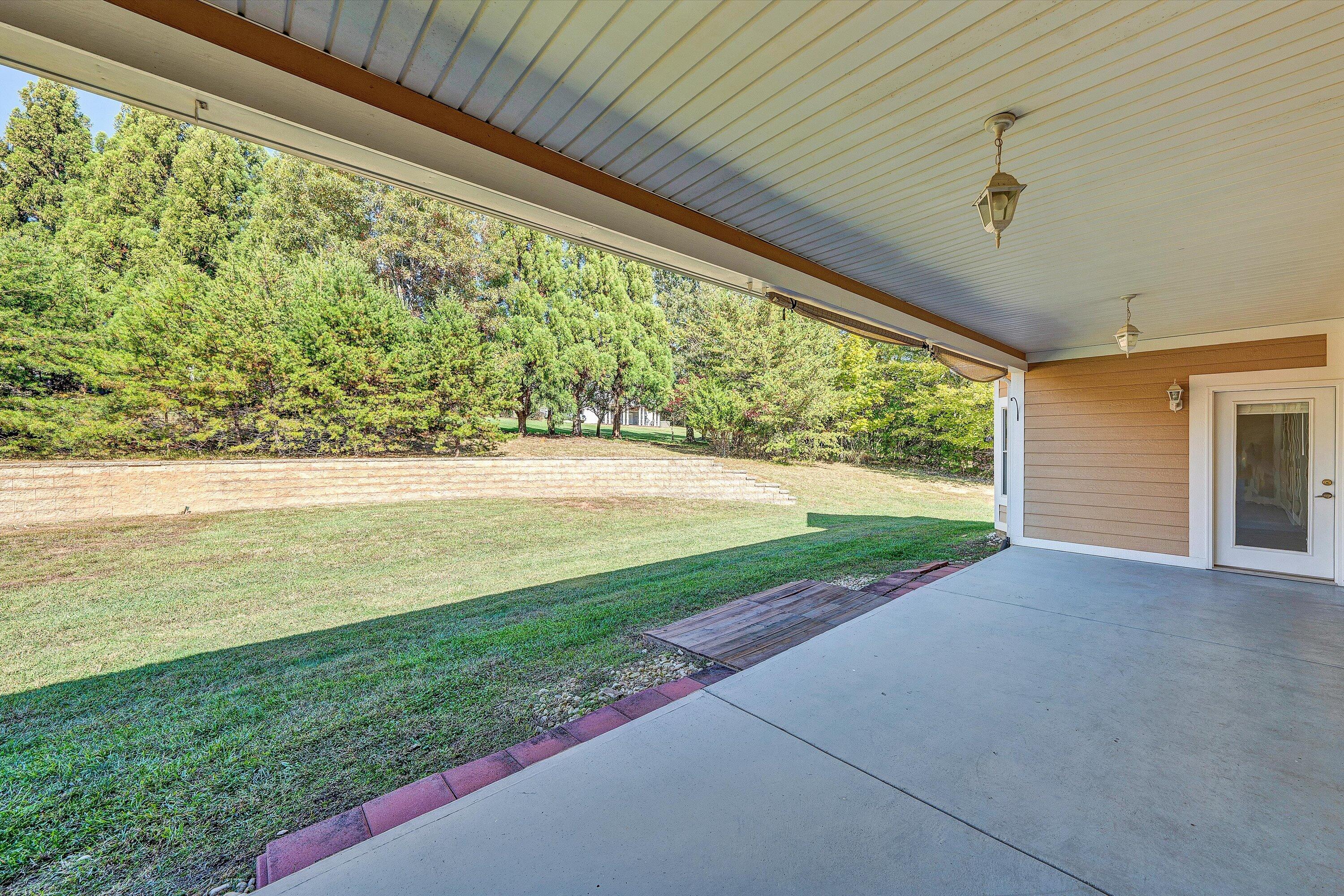 537 Calypso Road Moneta, VA 24121 - Photo 38 of 55 a view of a yard with an outdoor space