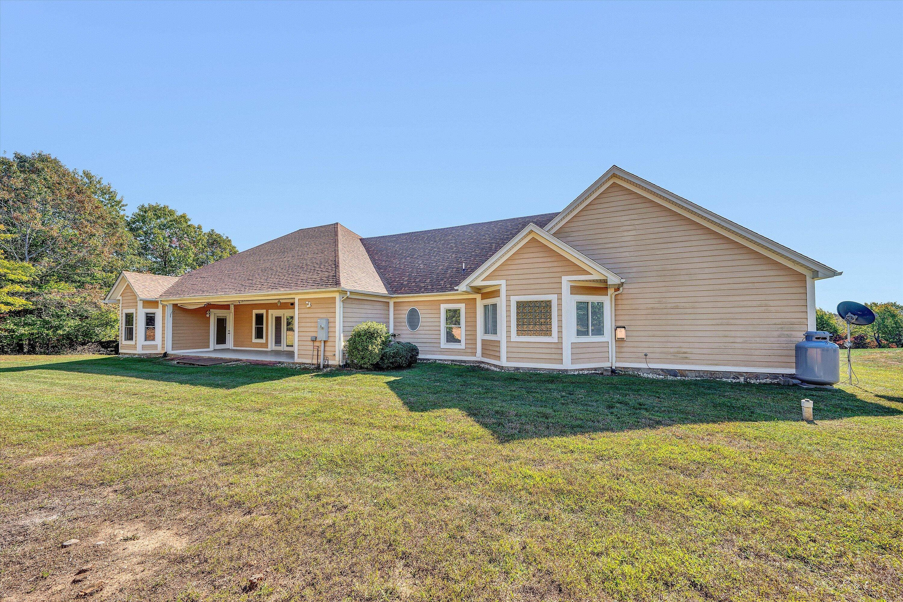 537 Calypso Road Moneta, VA 24121 - Photo 41 of 55 a view of a yard in front of a house
