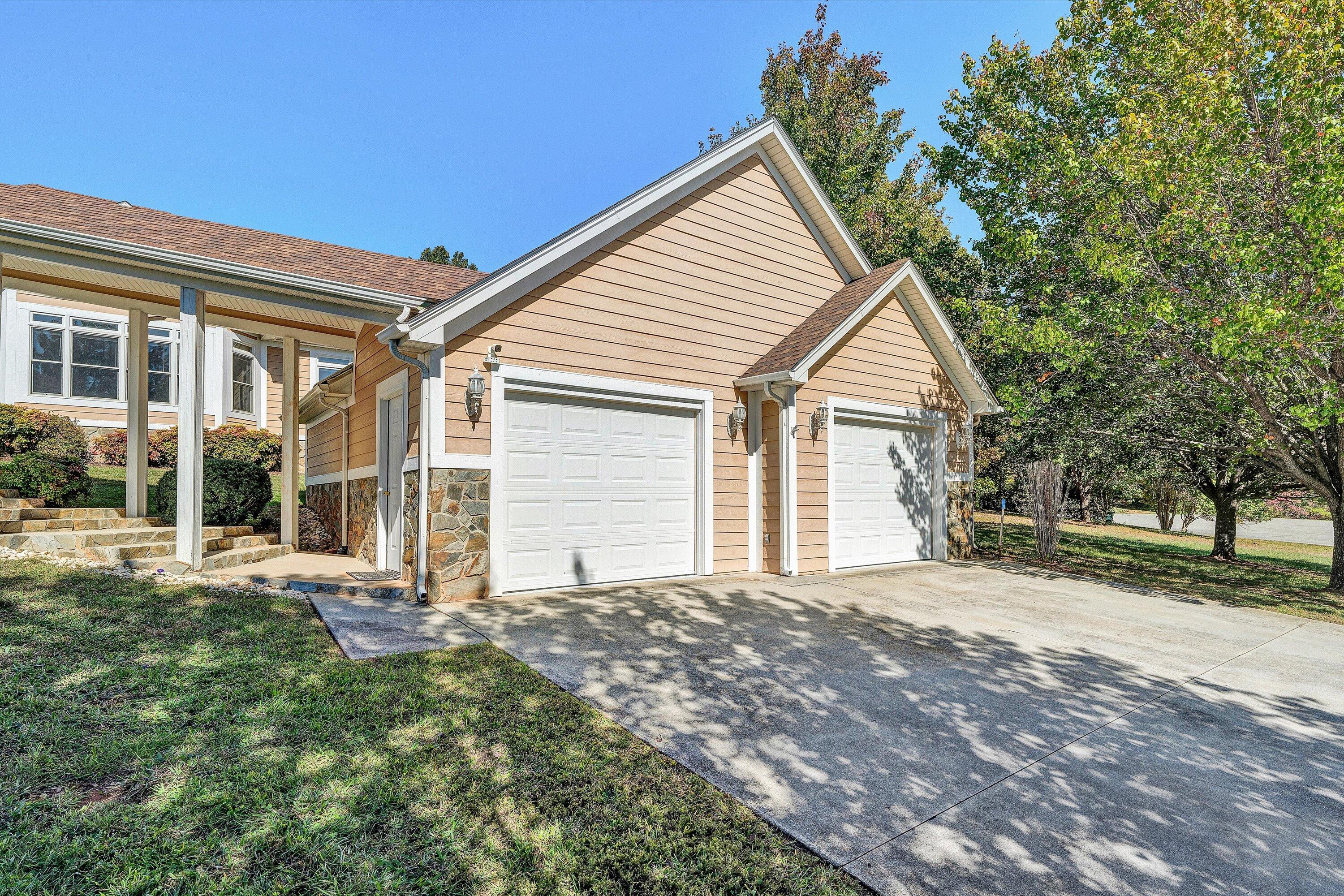 537 Calypso Road Moneta, VA 24121 - Photo 43 of 55 a view of a house with a yard and pathway