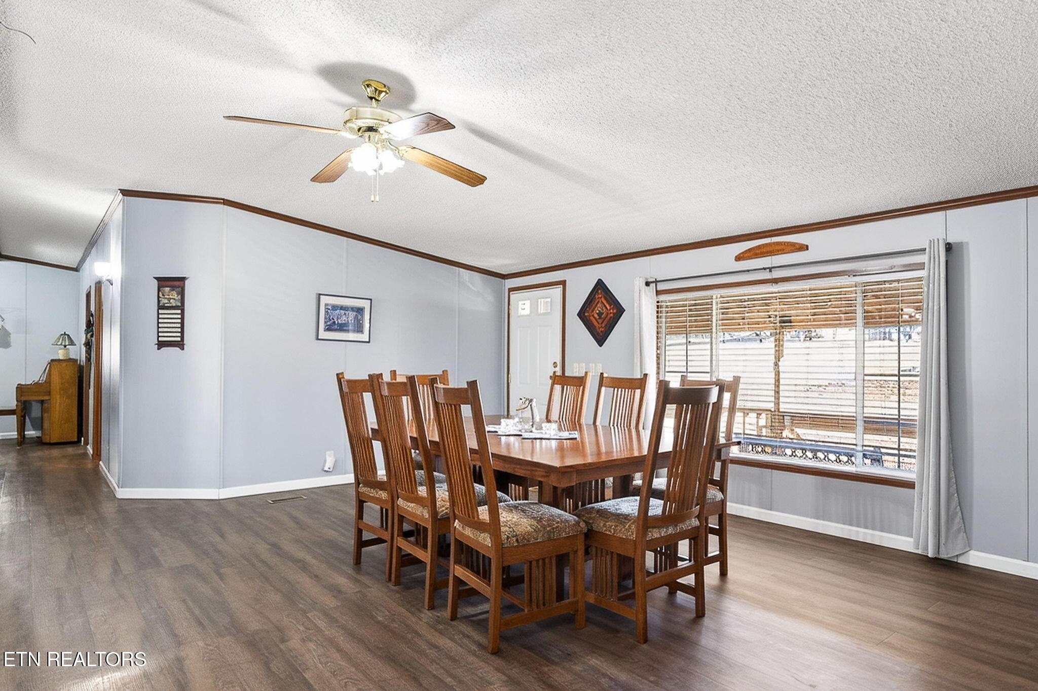 3773 Glade Creek Road Sparta, TN 38583 - Photo 11 of 59 a view of a dining room with furniture window and wooden floor