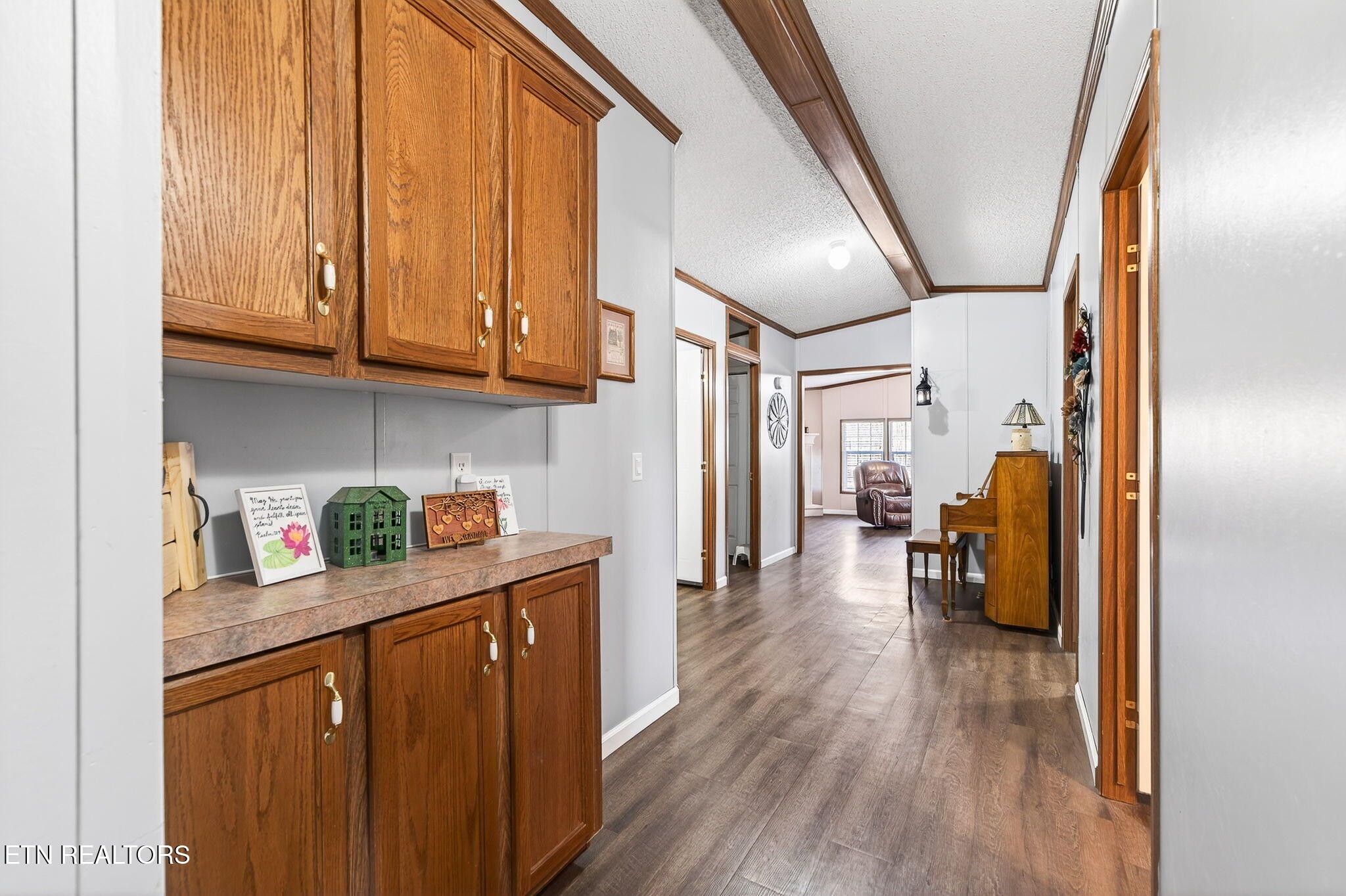 3773 Glade Creek Road Sparta, TN 38583 - Photo 20 of 59 a kitchen with refrigerator and wooden floor