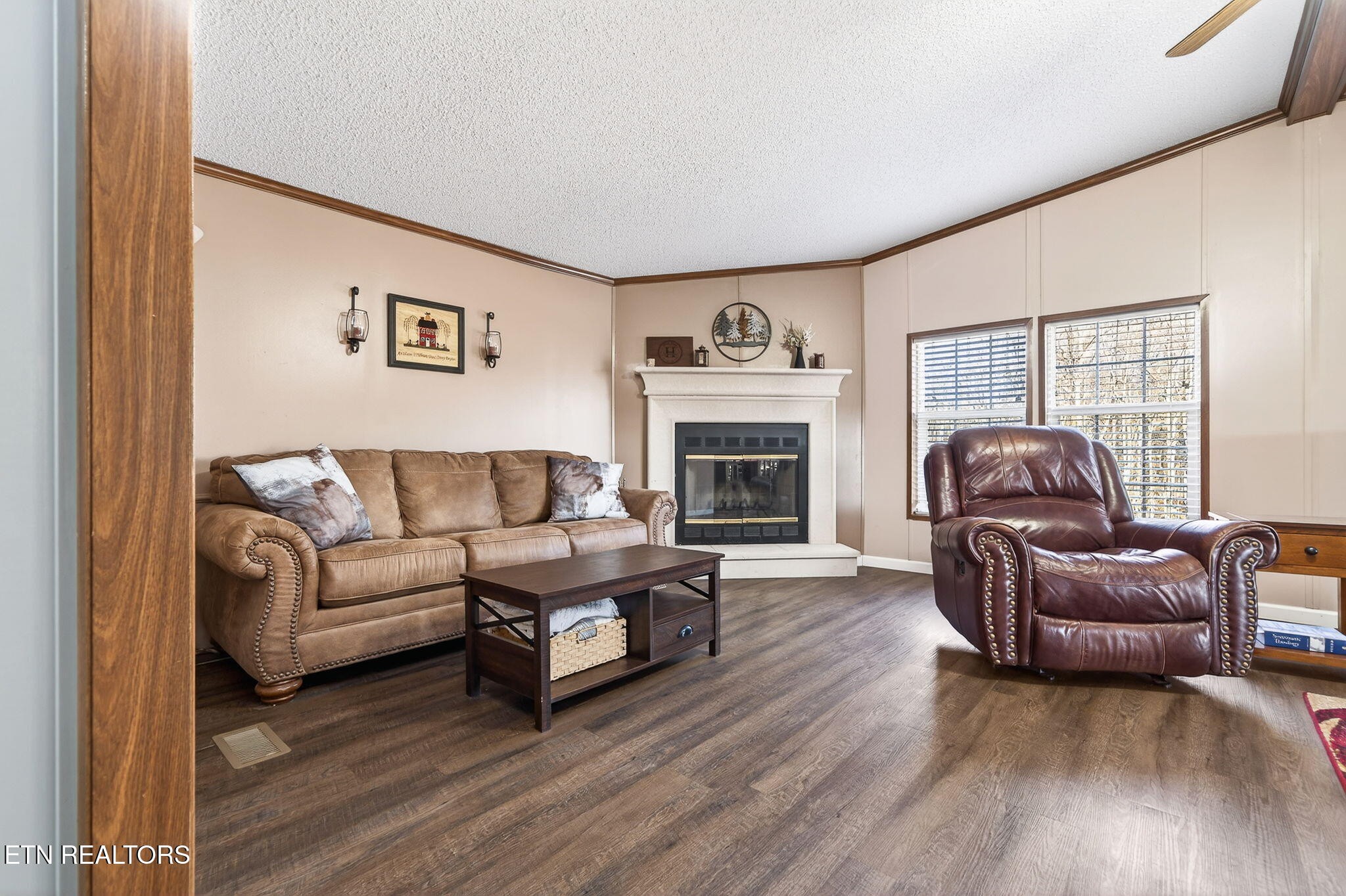 3773 Glade Creek Road Sparta, TN 38583 - Photo 27 of 59 a living room with furniture and a fireplace