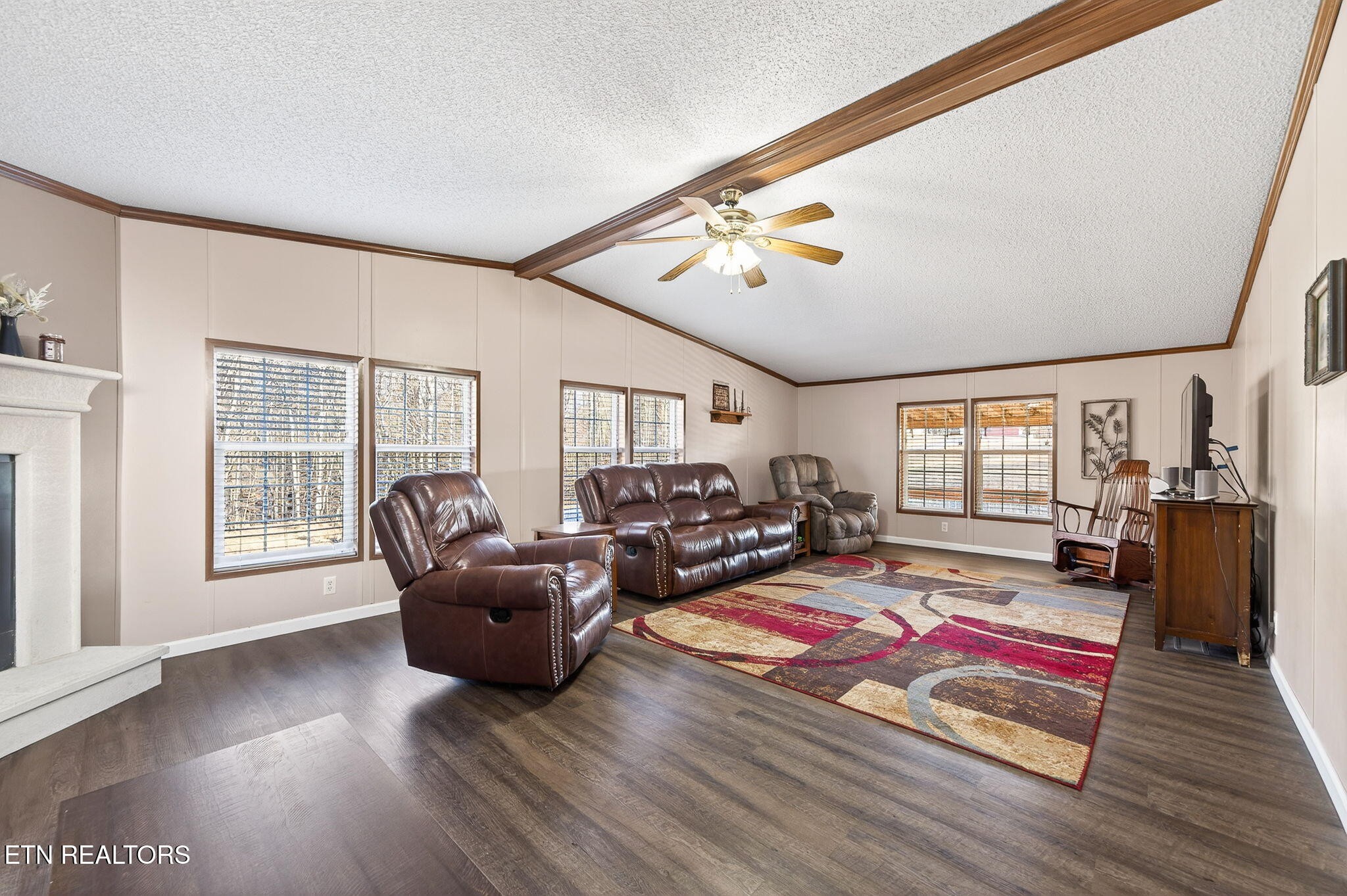 3773 Glade Creek Road Sparta, TN 38583 - Photo 28 of 59 a living room with furniture fireplace and wooden floor
