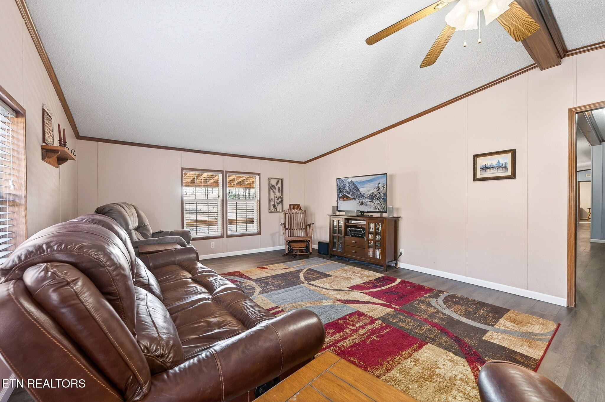 3773 Glade Creek Road Sparta, TN 38583 - Photo 29 of 59 a bed sitting in a bedroom next to a window with tv