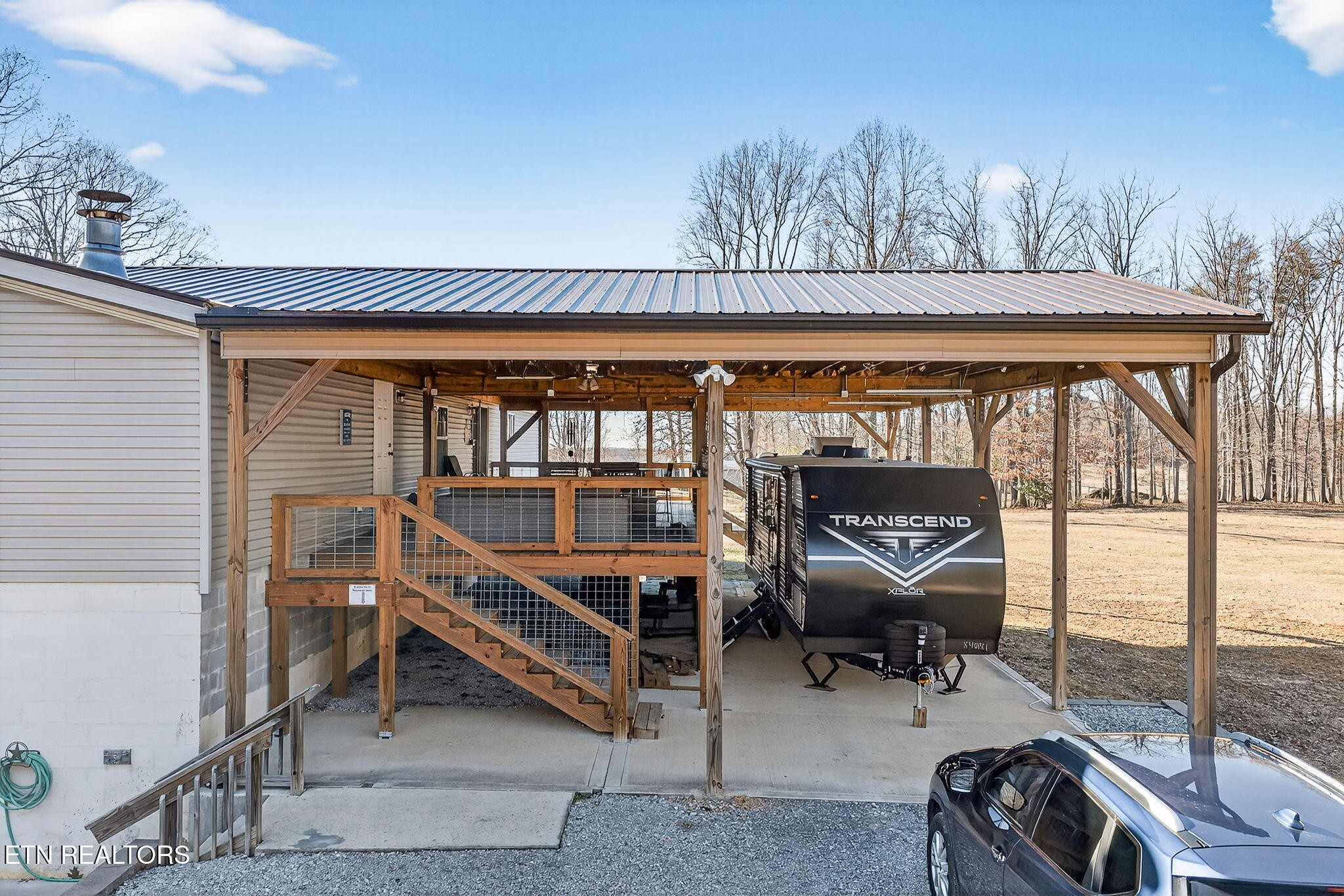 3773 Glade Creek Road Sparta, TN 38583 - Photo 30 of 59 a view of a chairs and tables in a balcony
