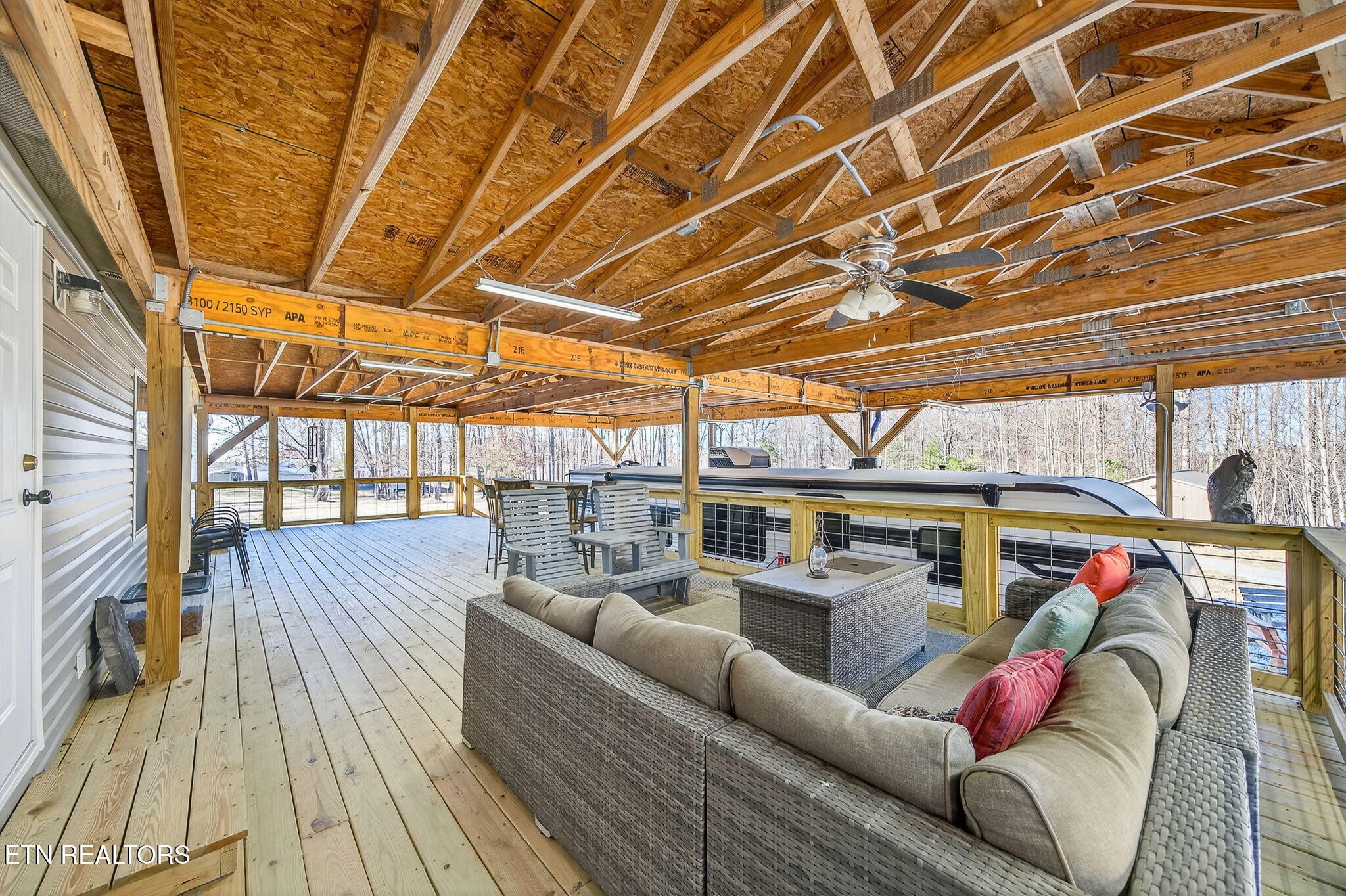 3773 Glade Creek Road Sparta, TN 38583 - Photo 3 of 59 a roof deck with couch and wooden floor